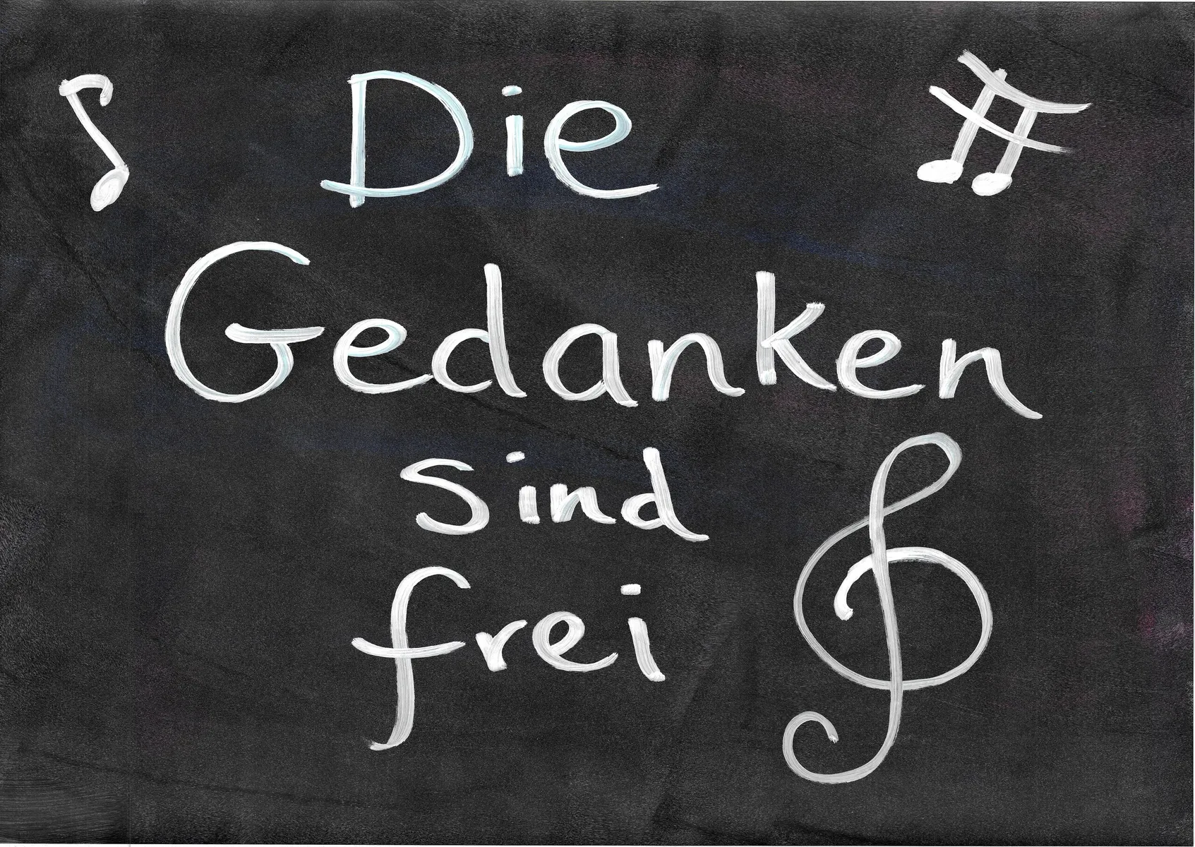 Plakat mit schwarzem Grund, einem weißen Violinenschlüssel, Noten und der Aufschrift: Die Gedanken sind frei.